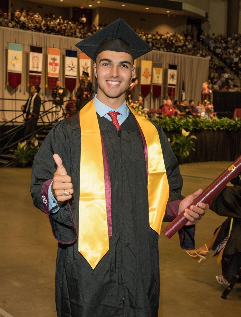 Randell in cap and gown at his Texas A&M graduation